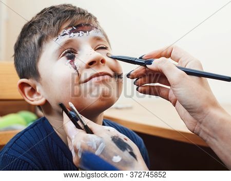 Little Cute Child Making Facepaint On Birthday Party, Zombie Apocalypse Facepainting, Halloween Prep