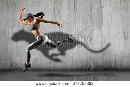 Sporty young woman running on wall background. Collage woman running