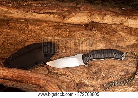 Army Knife And Plastic Scabbard Nearby. Army Knife And Case.