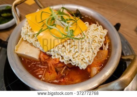 Korean food of army stew or army base stew (Budae Jjigae) in the restaurant