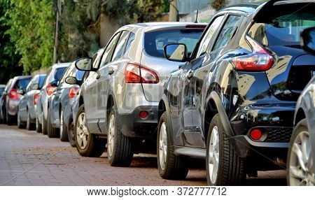Residential Parking. Parking Car In Line Back View