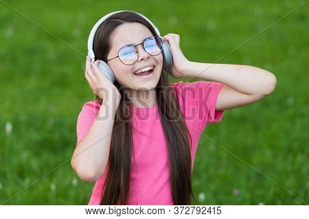 Adding Happiness Through Singing. Happy Singer Sing Song On Green Grass. Little Girl Enjoy Singing I
