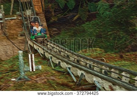 Canela, Brazil - July 21, 2019. People Having Fun On Sled Among Trees At The Alpen Amusement Park In