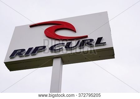 Bordeaux , Aquitaine / France - 11 18 2019 : Rip Curl Logo Surf Skate Store Clothes Boardshort Sign 