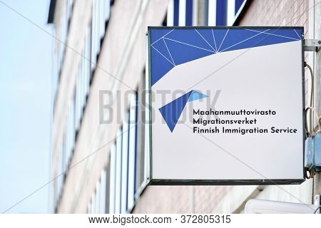 Kuopio, Finland - April 28, 2020: Finnish Immigration Service Signboard