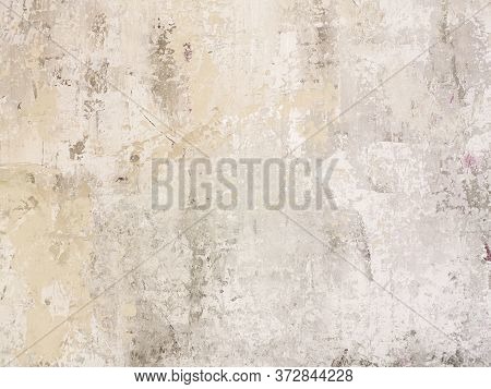 Beige Low Contrast Scratched Smooth Decorative Plaster Concrete Textured Background. Abstract Soft N