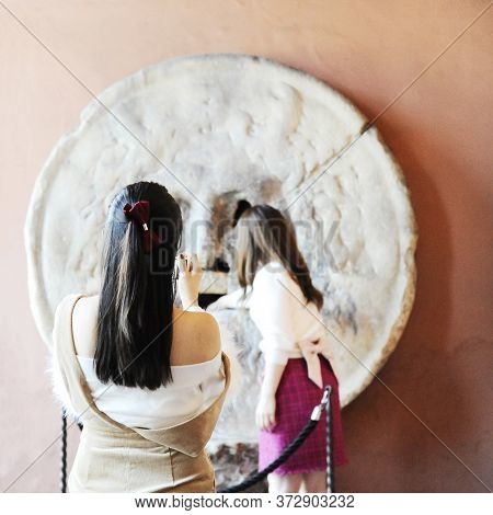 Beautiful Asian Women Photograph Each Other In Front Of The Mouth Of Truth (bocca Della Verità). Chu