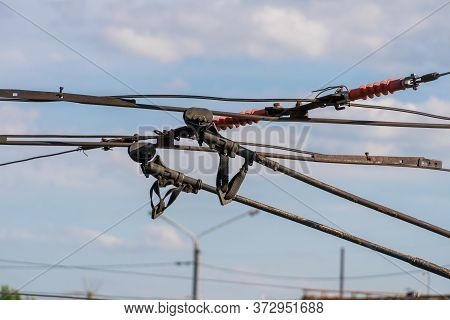 Trolleybus Horns, Wires On The Line For Trolleybuses Close-up Against The Sky.