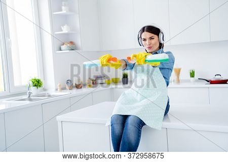 Portrait Of Positive Funky Funny Playful Woman Sit Table Hold Sprayer Bottle Spray Disinfect Kitchen