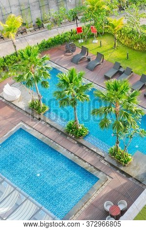 Swimming Pool Out Door With Green Grass Field
