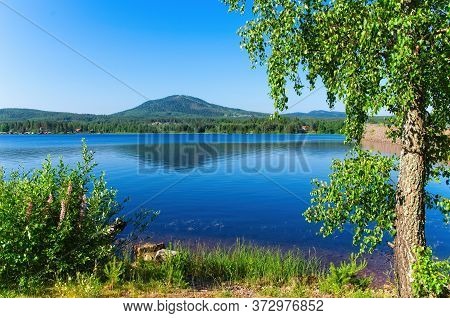 Scenes of the beautiful Siljan Lake and its rural surrounding on a sunny summer morning.