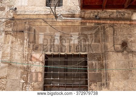 Jerusalem, Israel, June 13, 2020 : Oriental Scenery And Arabic Text Carved In Stone Above The Window