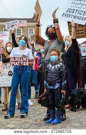 Richmond, North Yorkshire, Uk - June 14, 2020: A Cheering Protester Wears A Black Lives Matter Ppe F