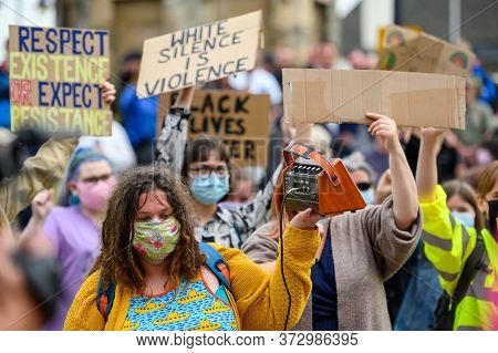 Richmond, North Yorkshire, Uk - June 14, 2020: British Blm Protesters Wear Ppe Face Masks And Hold H
