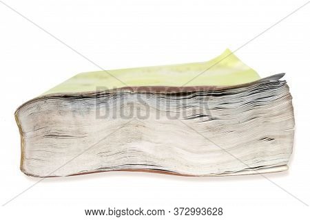 Clousep On The Fore Edge Of A Book Damaged By Water Against White Background