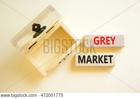 Grey Market Symbol. Concept Words Grey Market On Wooden Block. Beautiful White Table White Backgroun