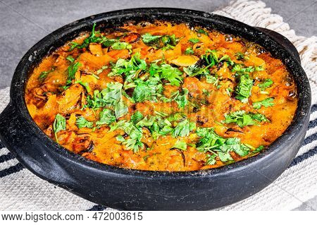 Charru Mussel, Known In Brazil As A Sururu Moqueca, On White Striped Towel In Blue