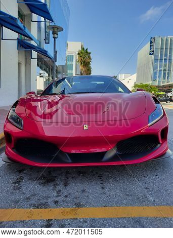 Los Angeles, California Usa - March 24, 2021: Red Ferrari F8 Tributo Luxury Sport Car Front View.
