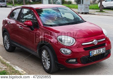 Side; Turkey -  January 27  2023:   White Fiat 500x  Parked On The Street On A Warm Summer Day Again