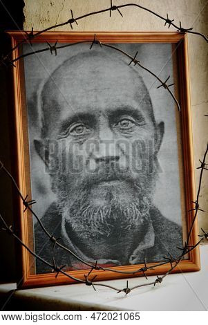 June 22, 2020-biysk, Russia. A Photo Of A Victim Of Stalin\'s Repressions Stands On The Windowsill O