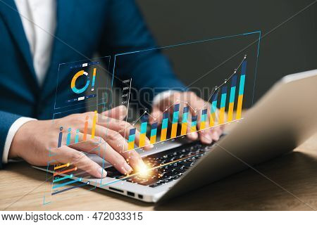 Businessman Analyzing Business Enterprise Data Management, Business Analytics With Charts, Metrics A