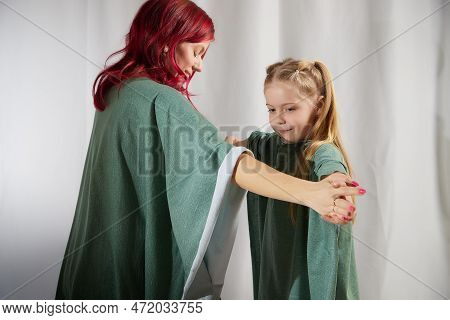 Amazing Pretty Mother And Daughter Having Fun And Dacncing Together. Red Haired Mom And Small Little