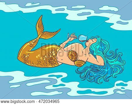 An Attractive Mermaid With A Golden Tail And Sea-colored Hair Is Drinking Wine. Expensive Drink And 
