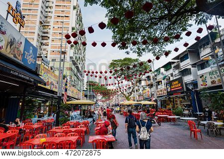 Kuala Lumpur, Malaysia - December 2022:  Jalan Alor Street With Restaurants And Tourist Near Bukit B