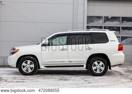 Novosibirsk, Russia - 04.03.2023: Side View Of Toyota Land Cruiser 200 J200 2013 Year White Color Af