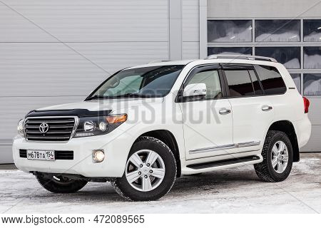 Novosibirsk, Russia - 04.03.2023: Front View Of Toyota Land Cruiser 200 J200 2013 Year White Color A