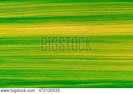 Beautiful Green Paint Brush On Yellow Background. Abstract Art Background, Oil Paint On Cement Table