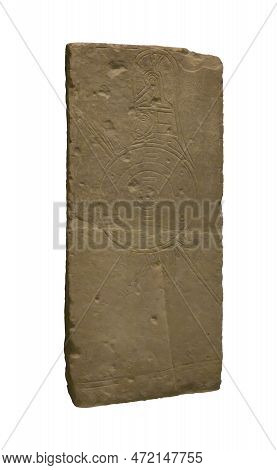 The Gravestone From Prinias Isolated On White Background. Limestone Grave Stele With A Carved Human 