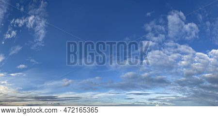 Natural Seasonal Blue Color Sky With White Clouds, Pure Tranguil Horizontal Outdoors Landscape. Clim