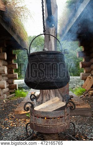 Cast Iron Boiler In The Capm, Cooking In Nature