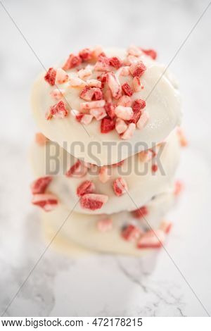 Stach Of Freshly Baked Peppermint White Chocolate Cookies On A Marble Background.