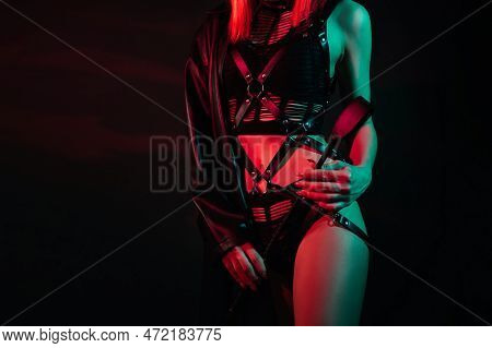 Woman With A Sexy Body In Beautiful Underwear Holds A Leather Flogger Whip In Her Hand For Bdsm Sex 
