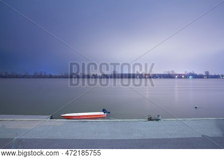 Selective Blur On A Log Exposure Of A Small Boat, Fisherman Ship; Anchored Standing On The Riverbank