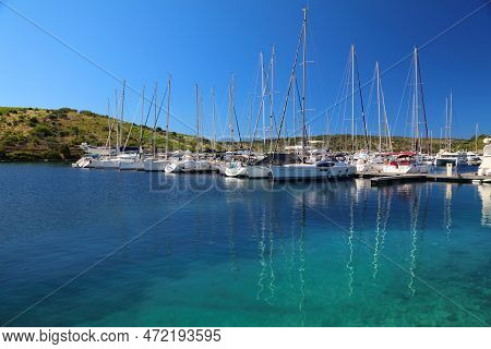 Primosten, Croatia - July 15, 2021: Sailboats Moored In Primosten Marina In Dalmatia. Croatia Is A F