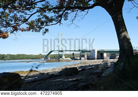 10 04 2022, Deer Isle, Maine, Usa: View On Deer Isle Bridge Framed By A Tree