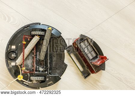 Robot Vacuum Cleaner On Laminate Wood Floor, Smart Robotic Automate Wireless Cleaning Technology Mac
