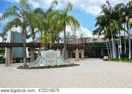 Placentia, California - 8 Mar 2023: Placentia Civic Center Sign With The Bell Tower Fountain Looking