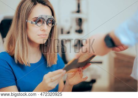 Woman Wearing A Trial Frame Taking An Eyesight Test