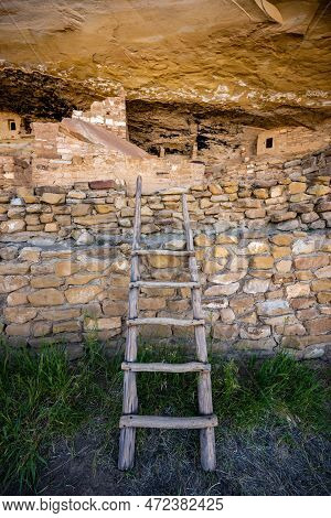 Pale Wooden Ladder Leans Against Wall In Mug House In Mesa Verde