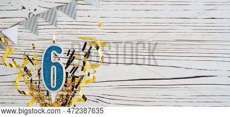 Number 6 Blue Celebration Candle On White Wooden Background. Happy Birthday Candles. Concept Of Cele