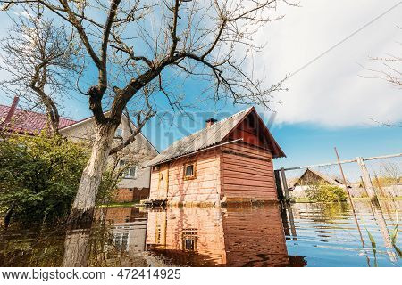Sauna Bath Building In Water During Spring Flood Floodwaters During Natural Disaster. Water Deluge D