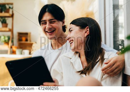 Couple Of Romantic Young People At Home, Vintage Style Photo