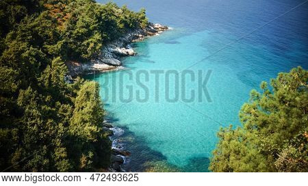 Summer Vacation On Tirquaz Water Of Aliki Beach On Thasos Or Thassos Greek Island In The Aegean Sea.