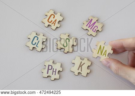 Set Of Puzzles With The Most Important Macronutrients With Colorful Inscriptions On A Beige Backgrou