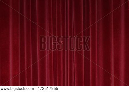 Vertical Fold On Red Velvet Curtains For Background And Design. Soft Focus
