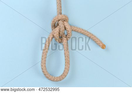 Rope Zeppelin Eye Knot, Or Rosendahl Loop On A Blue Background